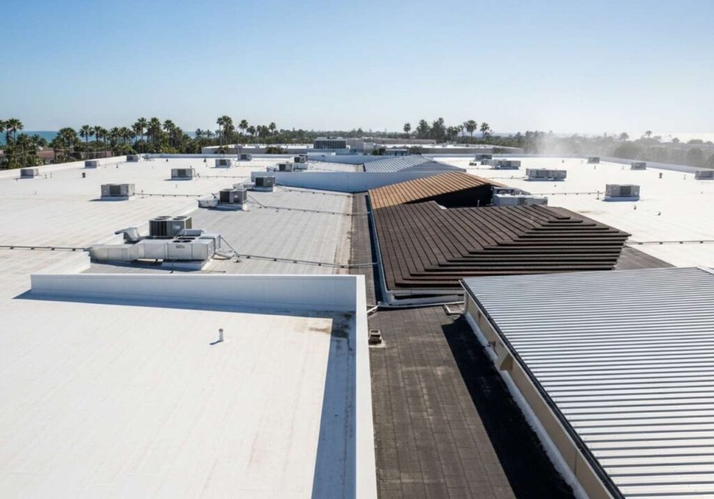 Comparison of TPO, PVC, modified bitumen, built-up, and metal commercial roofing materials in Florida sunlight.